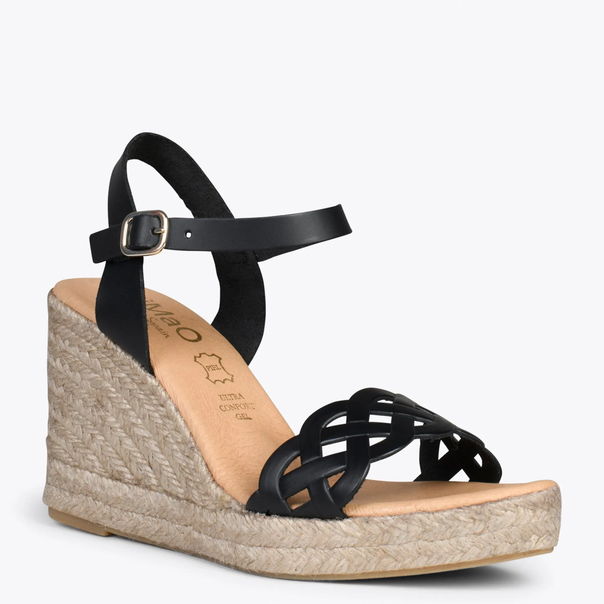 oasis__cunas_de_esparto_t_1-1.webp Esparto Y Alpargatas<miMaO Oasis – Cunas De Esparto Tostado Con Trenza Negro