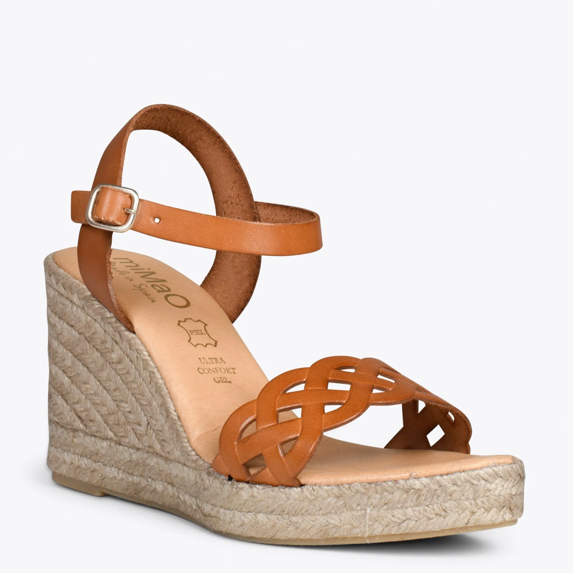 oasis__cunas_de_esparto_t_1-2.webp Esparto Y Alpargatas<miMaO Oasis – Cunas De Esparto Tostado Con Trenza Camel